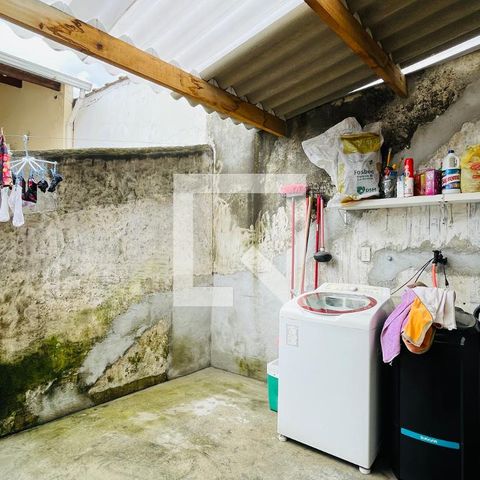 Casa à venda com 165m², 4 quartos e 2 vagas Casa à venda com 165m², 4 quartos e 2 vagasCozinha e Área de Serviço