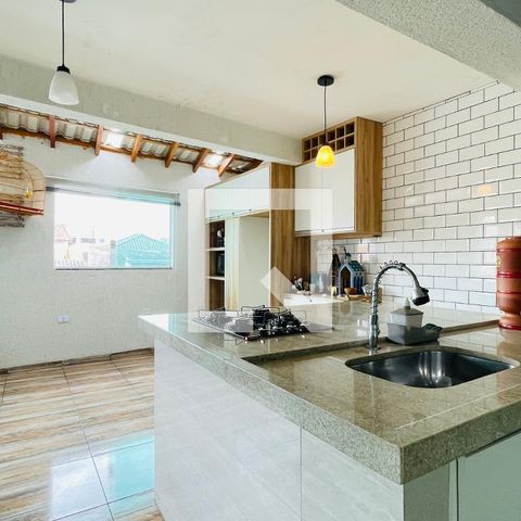 Casa à venda com 165m², 4 quartos e 2 vagas Casa à venda com 165m², 4 quartos e 2 vagasCozinha e Área de Serviço