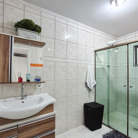 Casa para alugar com 376m², 4 quartos e 1 vagaBanheiro da Suíte 1