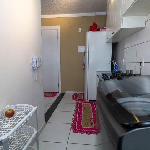 Apartamento à venda com 40m², 2 quartos e 1 vaga Apartamento à venda com 40m², 2 quartos e 1 vagaCozinha e Área de Serviço