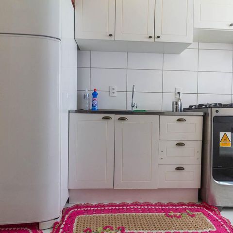 Apartamento à venda com 40m², 2 quartos e 1 vaga Apartamento à venda com 40m², 2 quartos e 1 vagaCozinha e Área de Serviço