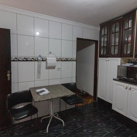 Casa à venda com 125m², 3 quartos e 2 vagas Casa à venda com 125m², 3 quartos e 2 vagasCozinha
