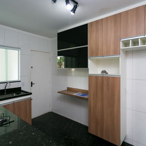 Casa à venda com 120m², 2 quartos e 3 vagas Casa à venda com 120m², 2 quartos e 3 vagasCozinha