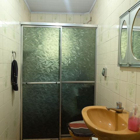 Casa à venda com 165m², 4 quartos e 2 vagasBanheiro