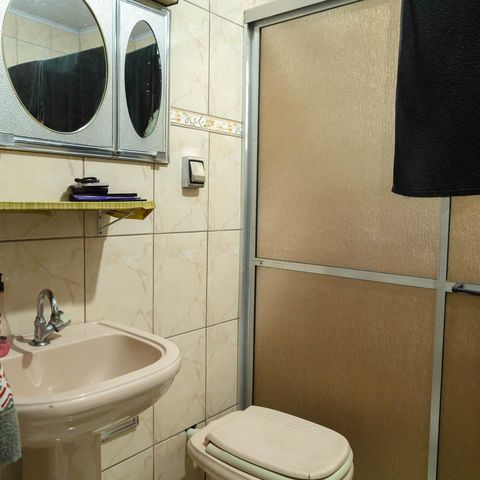 Casa à venda com 165m², 4 quartos e 2 vagasQuarto 04 Banheiro