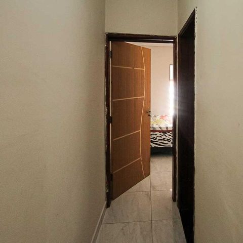 Casa à venda com 68m², 3 quartos e 2 vagas Casa à venda com 68m², 3 quartos e 2 vagasCorredor