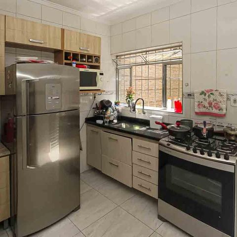 Casa à venda com 68m², 3 quartos e 2 vagas Casa à venda com 68m², 3 quartos e 2 vagasCozinha