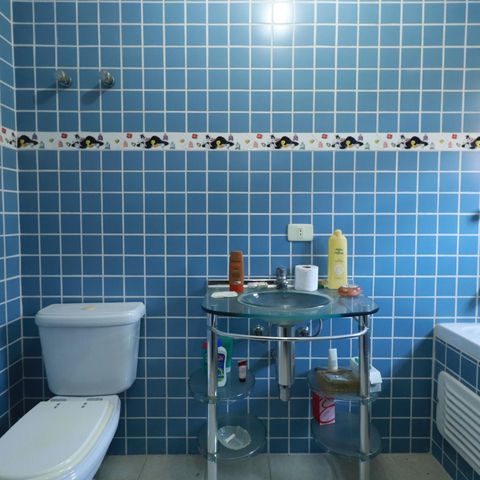 Casa à venda com 560m², 4 quartos e 2 vagasBanheiro da Suíte 2