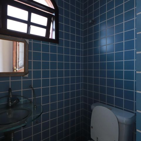 Casa à venda com 560m², 4 quartos e 2 vagasBanheiro de serviço