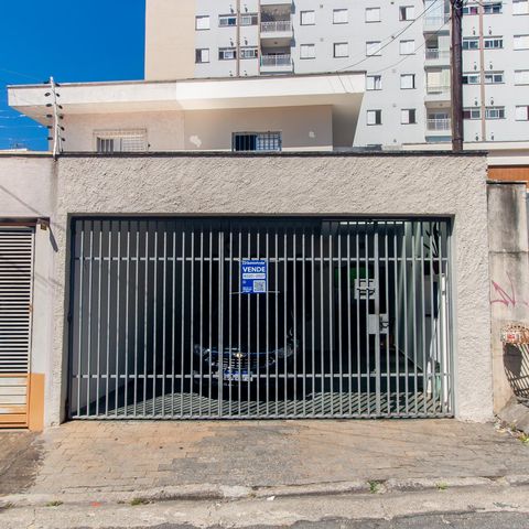 Casa à venda com 129m², 3 quartos e 2 vagas Casa à venda com 129m², 3 quartos e 2 vagasFachada e placa
