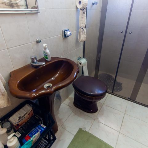 Casa à venda com 129m², 3 quartos e 2 vagas Casa à venda com 129m², 3 quartos e 2 vagasBanheiro