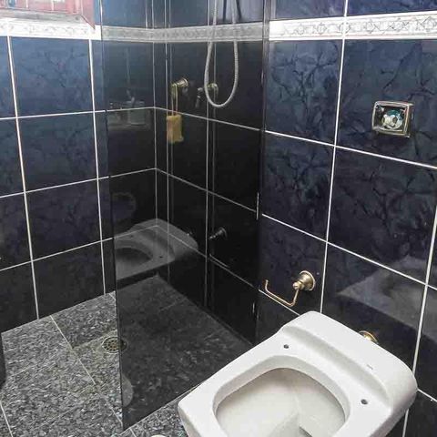 Casa à venda com 450m², 3 quartos e 8 vagas Casa à venda com 450m², 3 quartos e 8 vagasBanheiro da Suíte