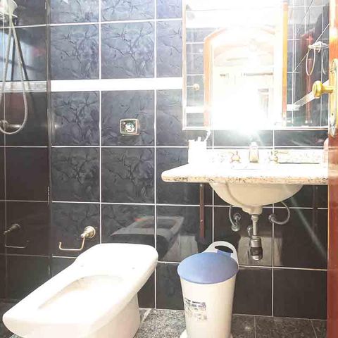 Casa à venda com 450m², 3 quartos e 8 vagas Casa à venda com 450m², 3 quartos e 8 vagasBanheiro da Suíte