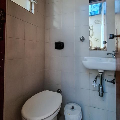 Casa à venda com 125m², 2 quartos e 1 vaga Casa à venda com 125m², 2 quartos e 1 vagaBanheiro de Serviço