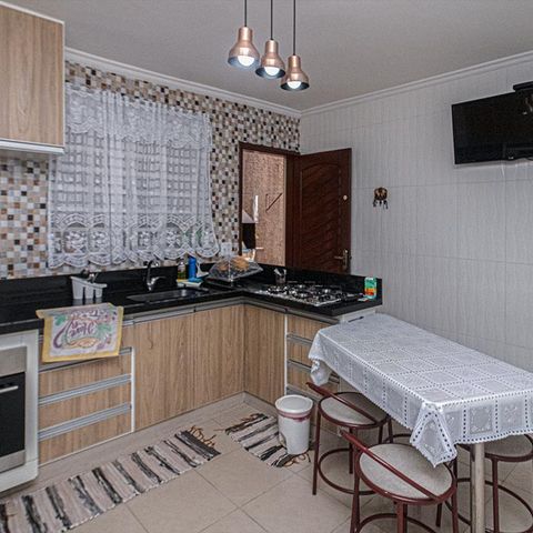 Casa à venda com 154m², 2 quartos e 4 vagas Casa à venda com 154m², 2 quartos e 4 vagasCozinha