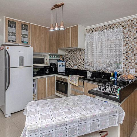 Casa à venda com 154m², 2 quartos e 4 vagas Casa à venda com 154m², 2 quartos e 4 vagasCozinha