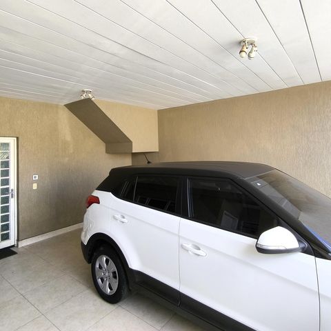 Casa à venda com 170m², 4 quartos e 2 vagas Casa à venda com 170m², 4 quartos e 2 vagasGaragem