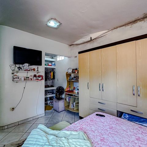Casa à venda com 234m², 6 quartos e 4 vagasQuarto 1 - Suíte