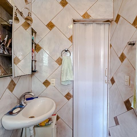 Casa à venda com 234m², 6 quartos e 4 vagasBanheiro da Suíte