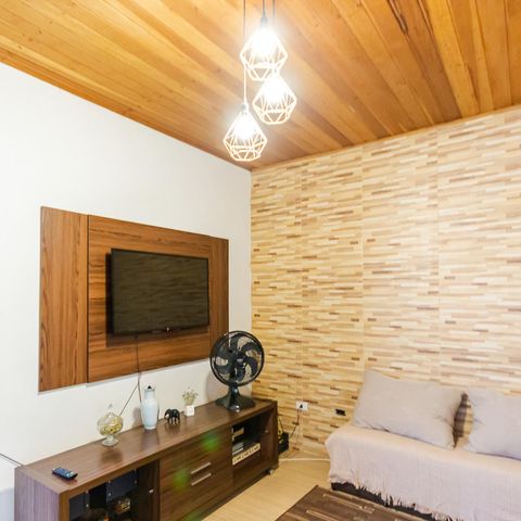 Casa à venda com 150m², 2 quartos e 2 vagas Casa à venda com 150m², 2 quartos e 2 vagasSala