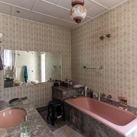 Casa à venda com 440m², 6 quartos e 8 vagasBanheiro da Suíte