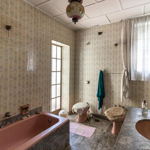 Casa à venda com 440m², 6 quartos e 8 vagasBanheiro da Suíte