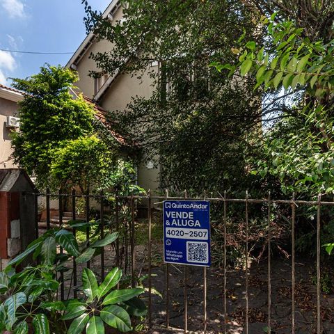 Casa à venda com 440m², 6 quartos e 8 vagasFachada e Plaquinha