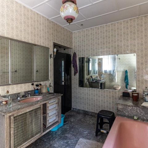 Casa à venda com 440m², 6 quartos e 8 vagasBanheiro da Suíte