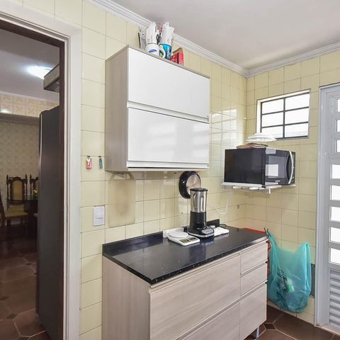 Casa à venda com 300m², 4 quartos e 5 vagas Casa à venda com 300m², 4 quartos e 5 vagasCozinha