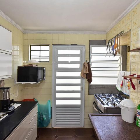 Casa à venda com 300m², 4 quartos e 5 vagas Casa à venda com 300m², 4 quartos e 5 vagasCozinha