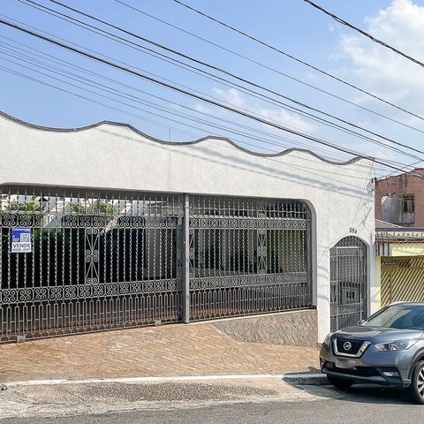 Casa à venda com 453m², 4 quartos e 3 vagasFachada + plaquinha