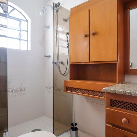 Casa à venda com 453m², 4 quartos e 3 vagasBanheiro da suíte