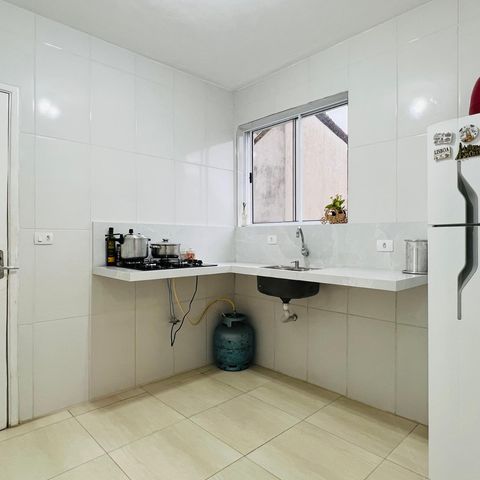 Casa à venda com 83m², 3 quartos e sem vaga Casa à venda com 83m², 3 quartos e sem vagaCozinha