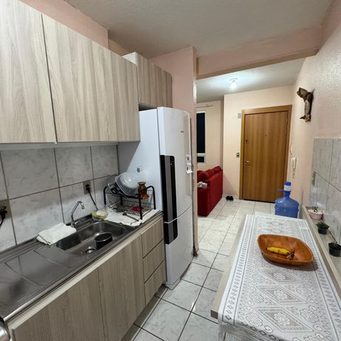 Apartamento à venda com 58m², 2 quartos e 1 vaga Apartamento à venda com 58m², 2 quartos e 1 vagaCozinha e Área de Serviço