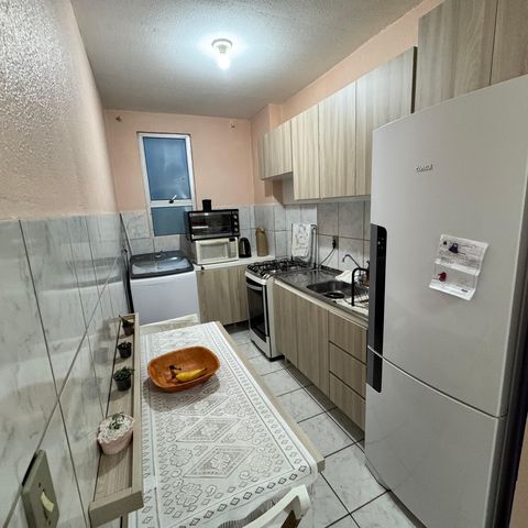 Apartamento à venda com 58m², 2 quartos e 1 vaga Apartamento à venda com 58m², 2 quartos e 1 vagaCozinha e Área de Serviço