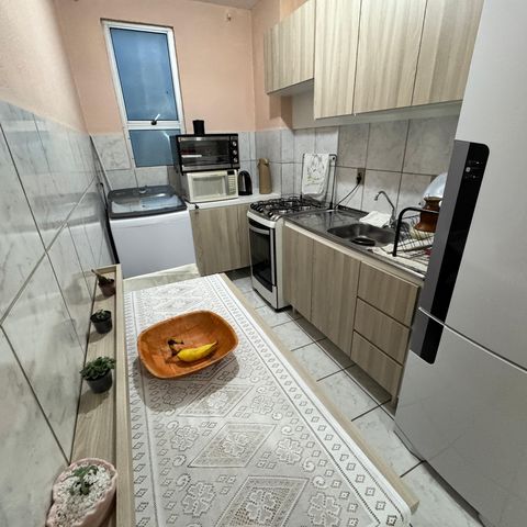 Apartamento à venda com 58m², 2 quartos e 1 vaga Apartamento à venda com 58m², 2 quartos e 1 vagaCozinha e Área de Serviço