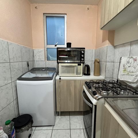 Apartamento à venda com 58m², 2 quartos e 1 vaga Apartamento à venda com 58m², 2 quartos e 1 vagaCozinha e Área de Serviço