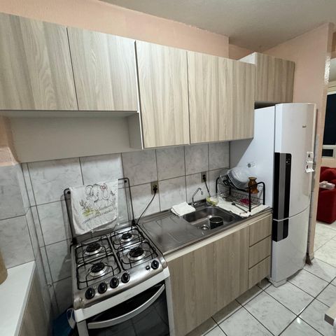 Apartamento à venda com 58m², 2 quartos e 1 vaga Apartamento à venda com 58m², 2 quartos e 1 vagaCozinha e Área de Serviço