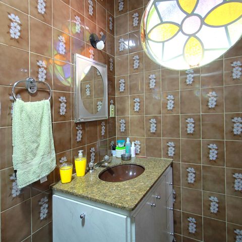 Casa à venda com 431m², 4 quartos e 1 vagaBanheiro da Suíte