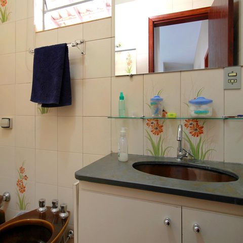 Casa à venda com 431m², 4 quartos e 1 vagaBanheiro