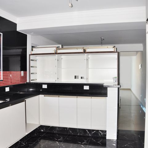 Casa à venda com 180m², 4 quartos e 4 vagas Casa à venda com 180m², 4 quartos e 4 vagasDetalhe - Cozinha Americana