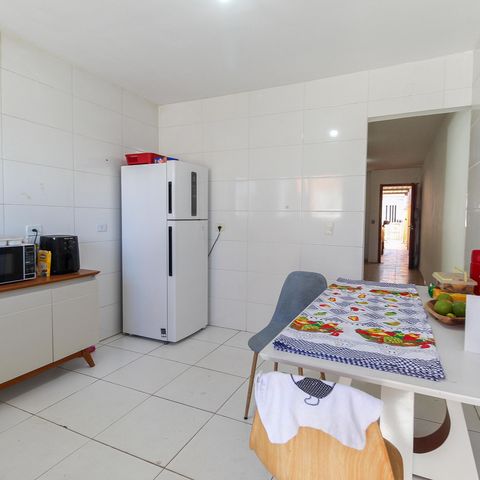 Casa à venda com 125m², 2 quartos e 2 vagas Casa à venda com 125m², 2 quartos e 2 vagasCozinha