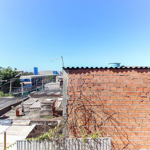 Casa à venda com 125m², 2 quartos e 2 vagas Casa à venda com 125m², 2 quartos e 2 vagasVista do Suíte 2