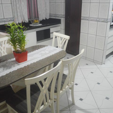 Casa à venda com 150m², 4 quartos e 2 vagas Casa à venda com 150m², 4 quartos e 2 vagasCozinha