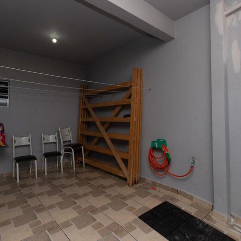 Casa à venda com 240m², 3 quartos e 1 vaga Casa à venda com 240m², 3 quartos e 1 vagaGaragem