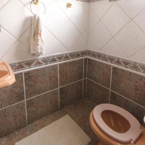 Casa à venda com 534m², 4 quartos e 10 vagas Casa à venda com 534m², 4 quartos e 10 vagasBanheiro de Serviço