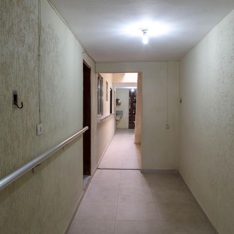 Casa à venda com 136m², 4 quartos e 2 vagas Casa à venda com 136m², 4 quartos e 2 vagasCorredor externo