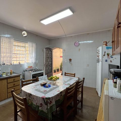 Casa à venda com 200m², 3 quartos e 3 vagas Casa à venda com 200m², 3 quartos e 3 vagasCozinha