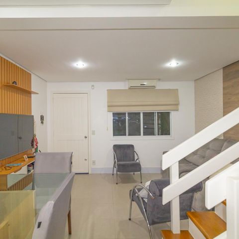 Casa de condomínio à venda com 88m², 3 quartos e 2 vagas Casa de condomínio à venda com 88m², 3 quartos e 2 vagasSala