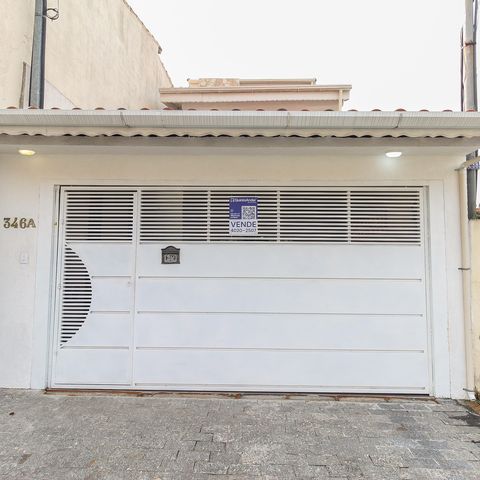 Casa à venda com 131m², 3 quartos e 2 vagasFachada e Placa